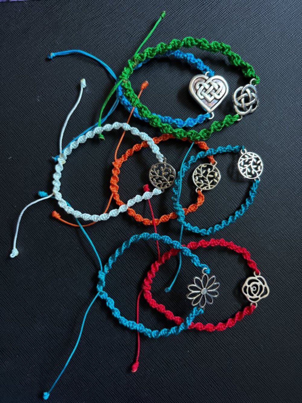 Lot of 7 Handmade Adjustable Braided Bracelets Silvertone Celtic & Floral Charms